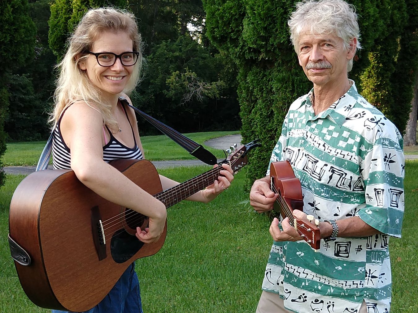 Zebie with guitar student in Ann Arbor